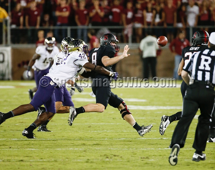 2013Stanford-Wash-060.JPG - Oct. 5, 2013; Stanford, CA, USA; Stanford Cardinal quarterback Kevin Hogan (8) pitches out to Tyler Gaffney (25) under pressure from Washington Husky linebacker Cory Littleton (42) at  Stanford Stadium. Stanford defeated Washington 31-28.