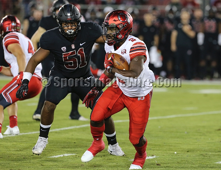 20181006StanfordUtah-010.JPG - Oct. 6, 2018; Stanford, CA.; Utah running back Zack Moss (2)  carries the ball during an NCAA football game between the Stanford Cardinal and the Utah Utes at Stanford Stadium. Utah defeated Stanford 40-21. 