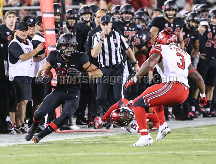 20181006StanfordUtah-015.JPG - Oct. 6, 2018; Stanford, CA.; Stanford running back Cameron Scarlett (22) rushes for 7 yards during an NCAA football game between the Stanford Cardinal and the Utah Utes at Stanford Stadium. Utah defeated Stanford 40-21. 