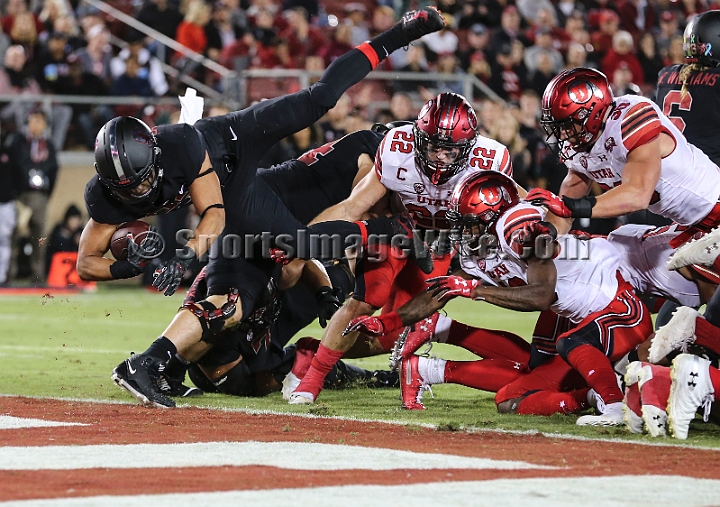 20181006StanfordUtah-031.JPG - Oct. 6, 2018; Stanford, CA.; Stanford running back Cameron Scarlett (22) scores on a 1-yard run in the third quarter during an NCAA football game between the Stanford Cardinal and the Utah Utes at Stanford Stadium. Utah defeated Stanford 40-21. 