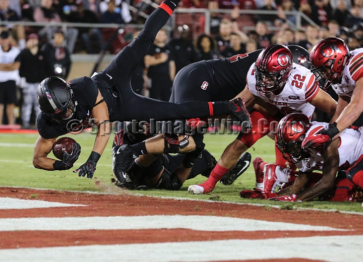 20181006StanfordUtah-032.JPG - Oct. 6, 2018; Stanford, CA.; Stanford running back Cameron Scarlett (22) scores on a 1-yard run in the third quarter during an NCAA football game between the Stanford Cardinal and the Utah Utes at Stanford Stadium. Utah defeated Stanford 40-21. 